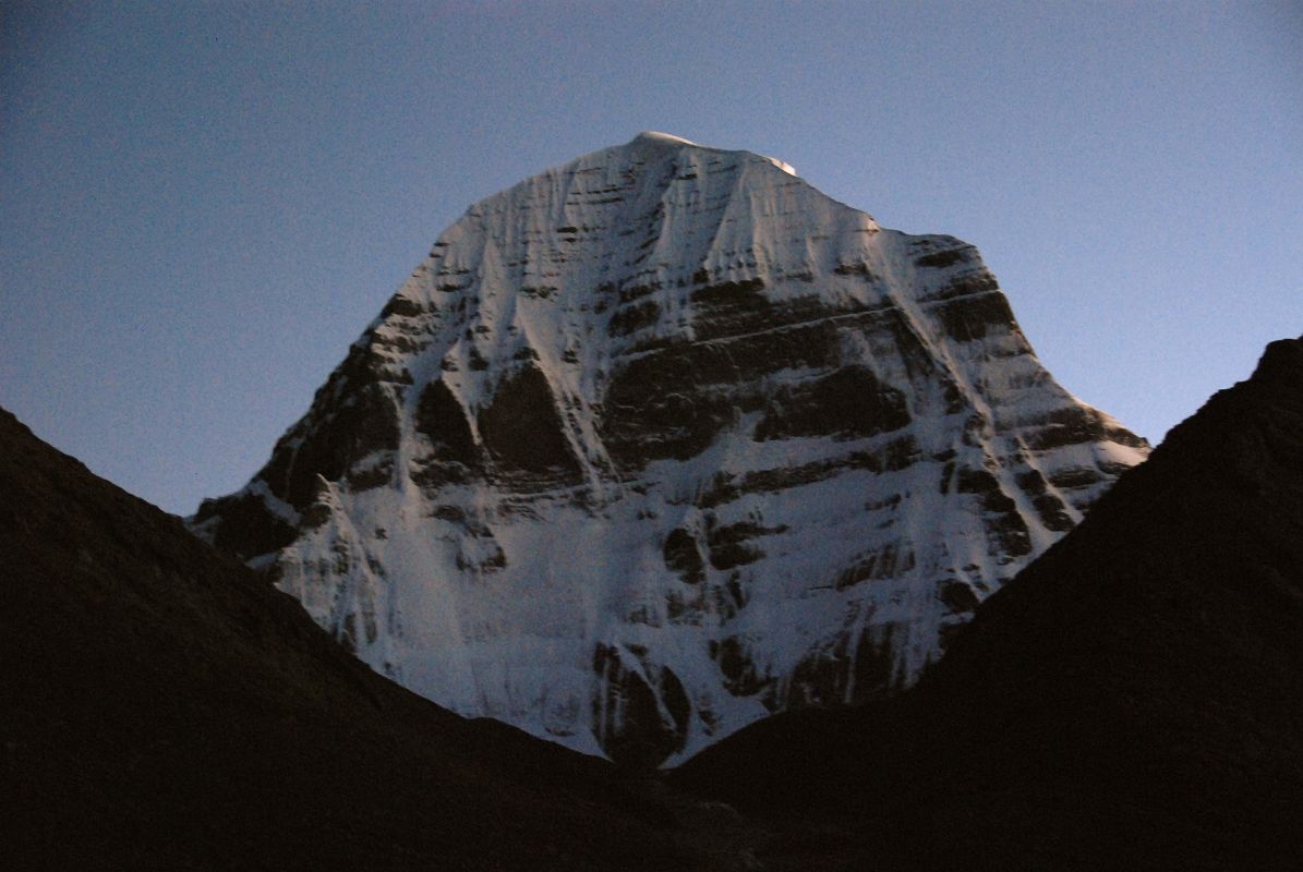 38 Mount Kailash North Face At Sunset On Mount Kailash Outer Kora In October the setting sun doesnt shine on Mount Kailash North Face. When I was here in July 2006, the sun did illuminate the face at sunset.